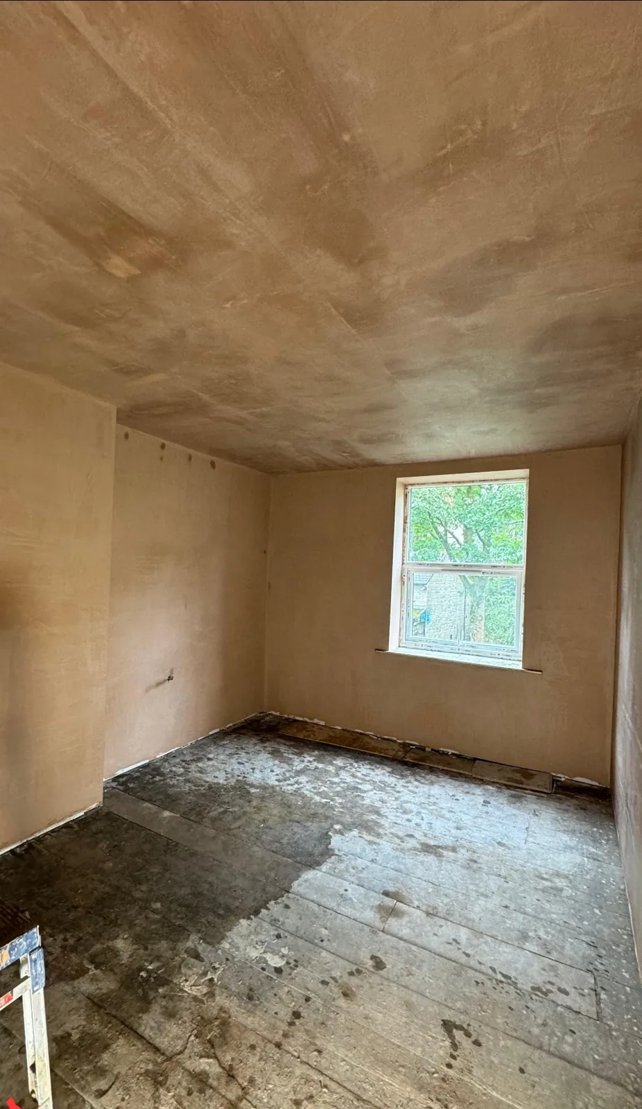 Freshly plastered room by Tameside Plastering, walls and ceiling skimmed