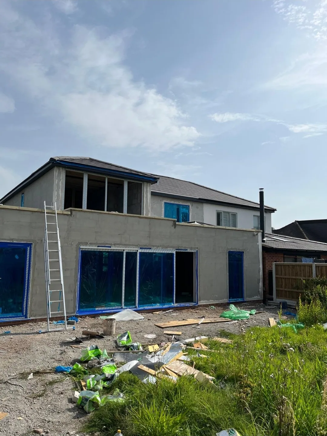 Rear extension refurbishment with blockwork and glazing installed